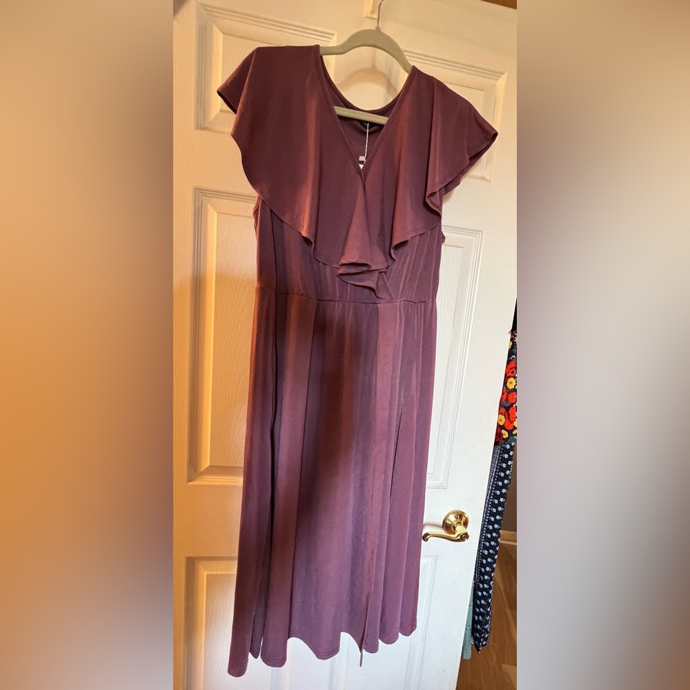 Party time! Elegant sleeveless plum colored faux wrapped midi dress w/mini cape.